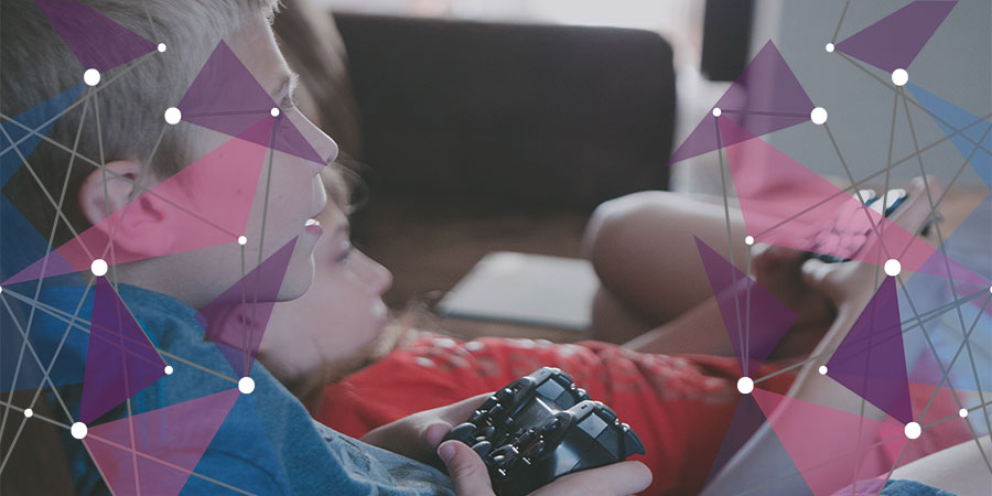 Two children playing a video game intended to improve brain development